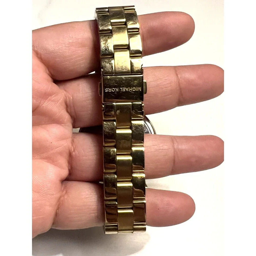 Michael Kors Norie Quartz Movement Quiet Luxury Gold Dial Ladies Watch MK3560